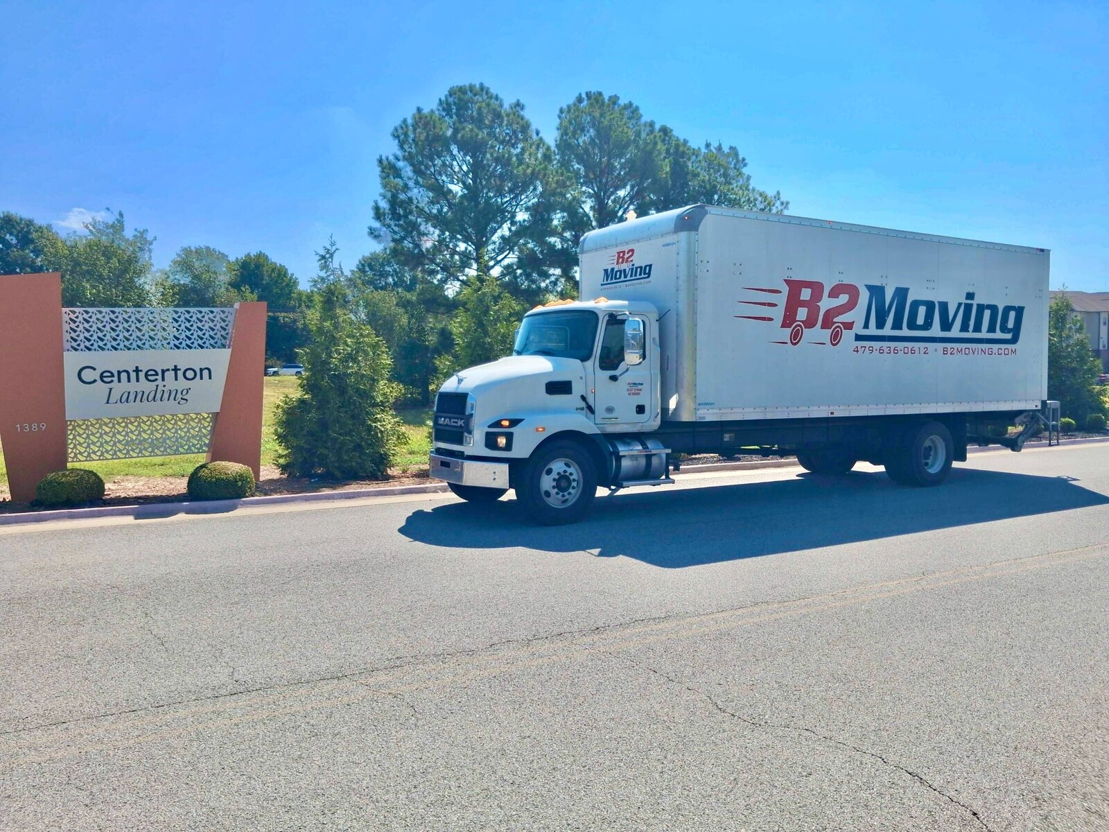B2 Moving truck near the Centerton Landing entrance in Centerton, Arkansas