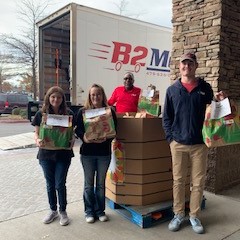 B2 Moving food drive with Harps and NWA Food Bank