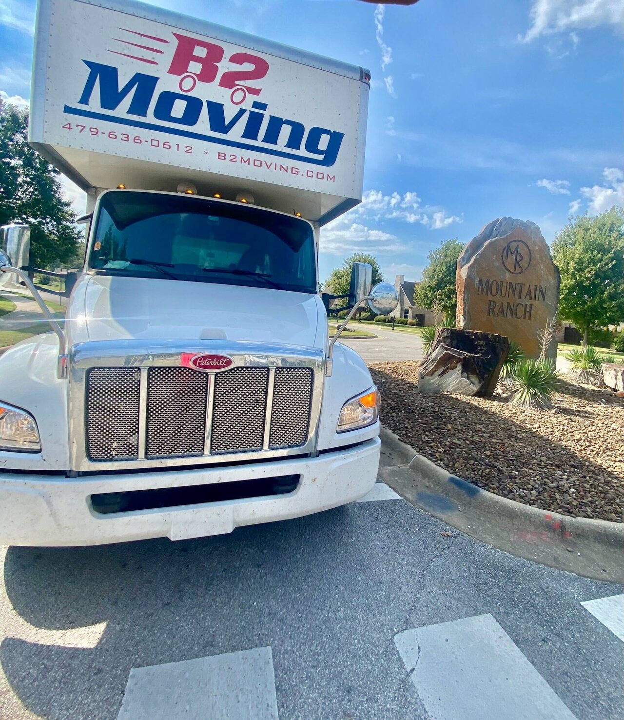 B2 Moving truck near the Mountain Ranch neighborhood entrance in Fayetteville, Arkansas