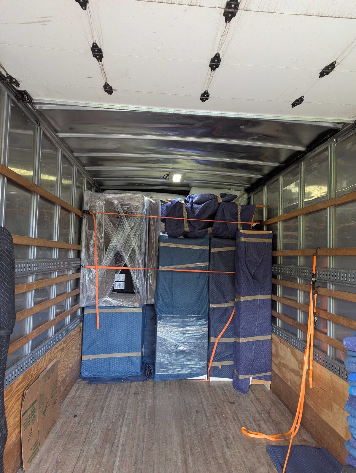 First stage of a padded and secured B2 MAX CUBE interstate truck load in Tontitown