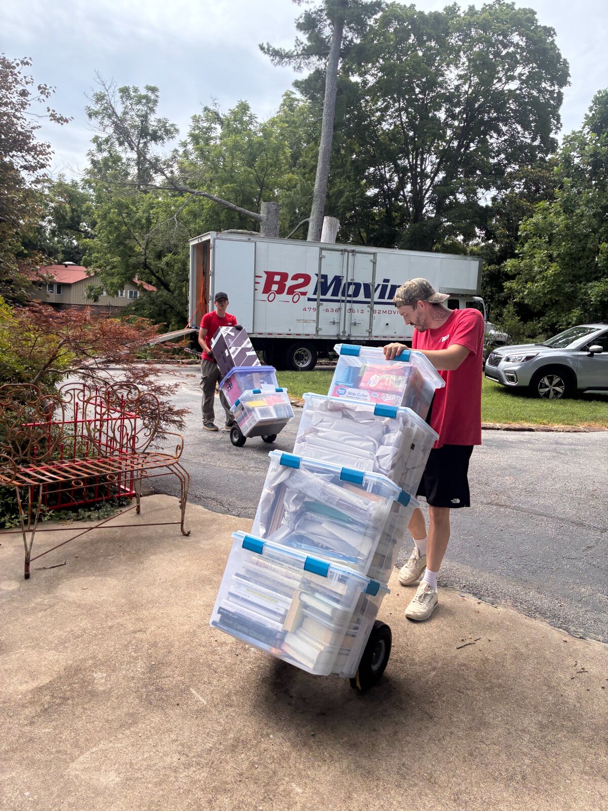 Dakota and Brandon Taylor loading household belongings during a Pea Ridge move